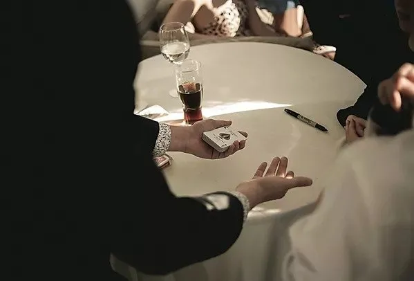 Magician performing a card trick